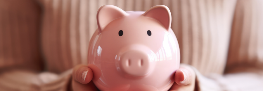 Inflation Drives 2025 HSA Contribution Limits Up Again: A female holding a piggy bank.