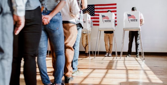 Polling Place Safety in Schools, People voting at a booth