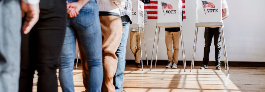 Polling Place Safety in Schools, People voting at a booth