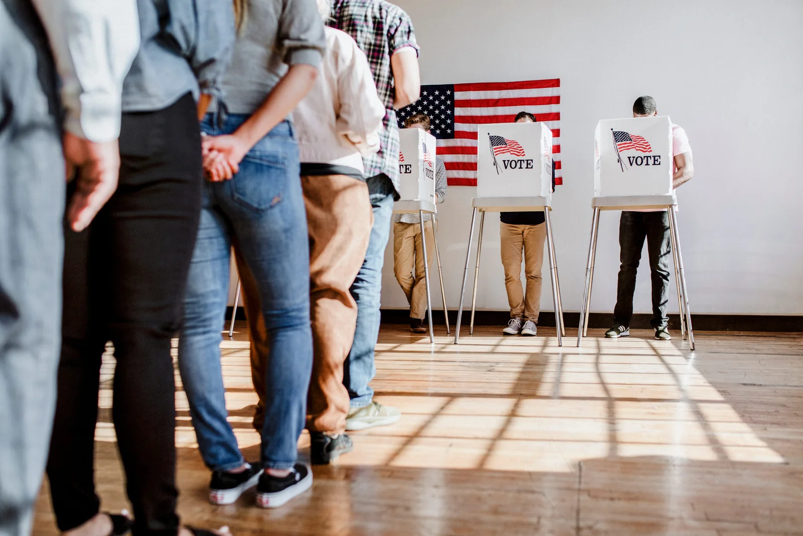 Polling Place Safety in Schools, People voting at a booth