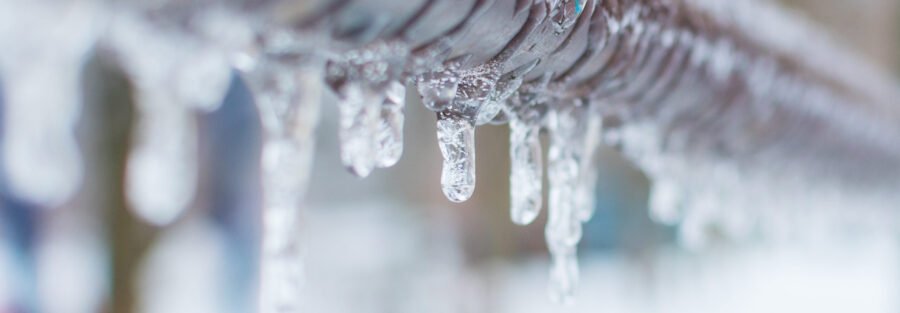 frozen pipes with icicles