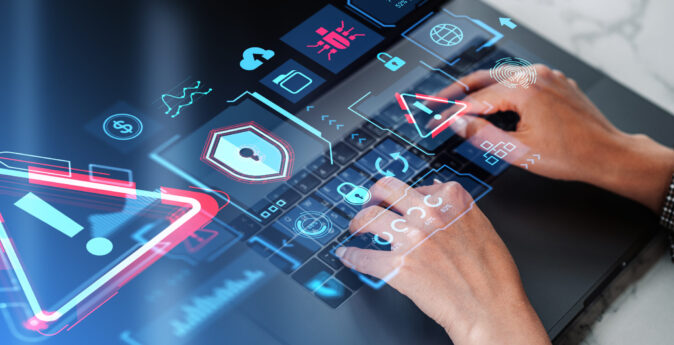 Hands of businesswoman using laptop at office table with double exposure of immersive cybersecurity interface. Concept of data protection